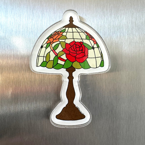 Acrylic magnet featuring a Tiffany-style stained glass lamp with a red rose and green leaves on a cream background